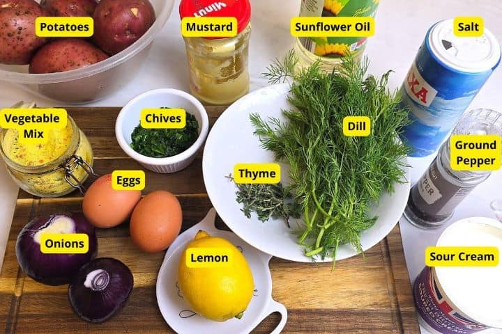 Ingredients for creamy potato salad base and scratch-made mayo dressing arranged on a kitchen table.