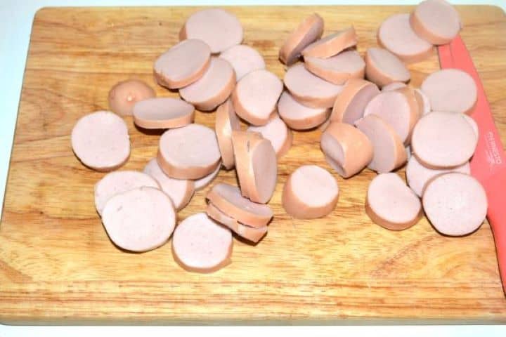 Sliced Frankfurters Sliced Frankfurter Sausage on the Board