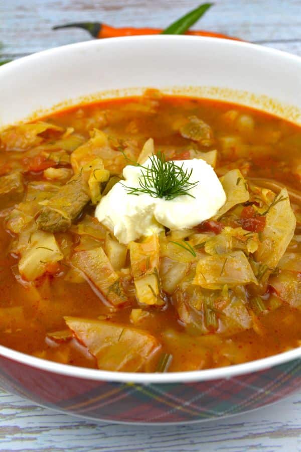 Cabbage Soup With Pork Meat-Served in Bowl With Sour Cream
