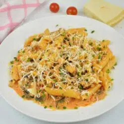 Pasta With Pork Mince-Served on Plate With Grated Grana Padano on Top