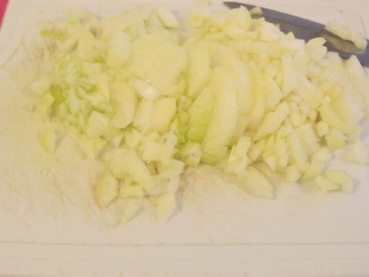 Cabbage Casserole Recipe-Chopped Onion Chopped Onion on the Cutting Board
