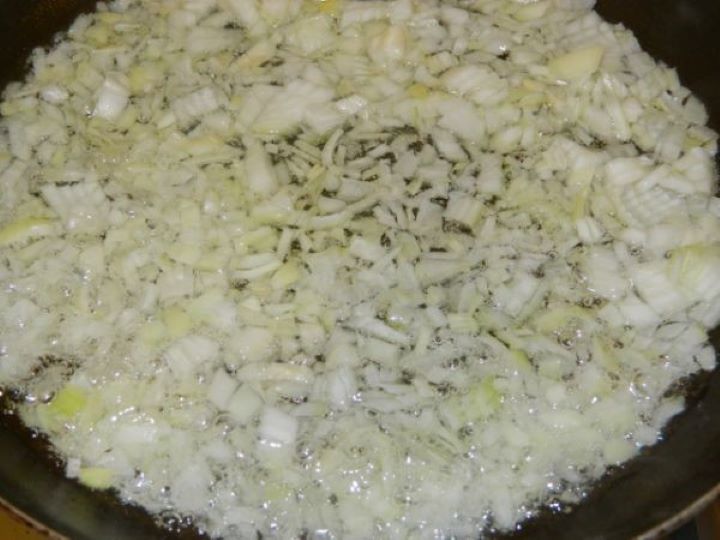 Cabbage Casserole Recipe-Frying Chopped Onion Frying Chopped Onion in the Pan