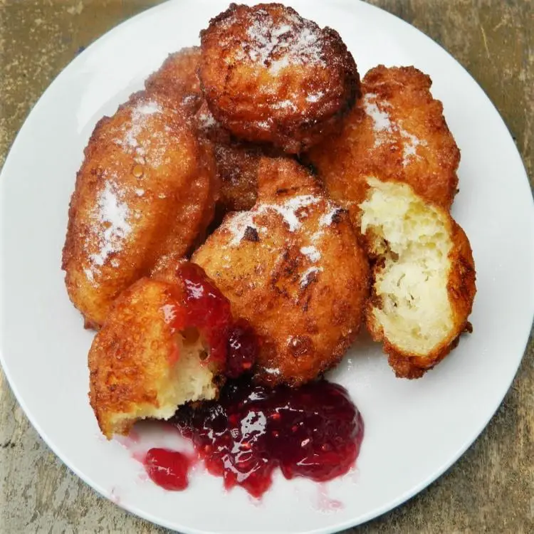 cottage cheese donuts served with raspberry jam