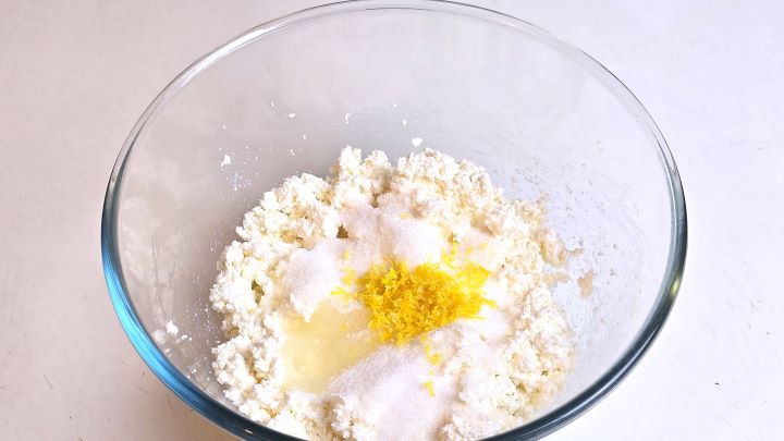 Cottage Cheese, Sugar and Lemon Zest in the Glass Bowl