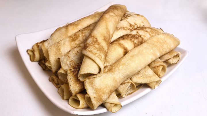 Cottage Cheese Filled Crepes Ready to Serve on the Plate