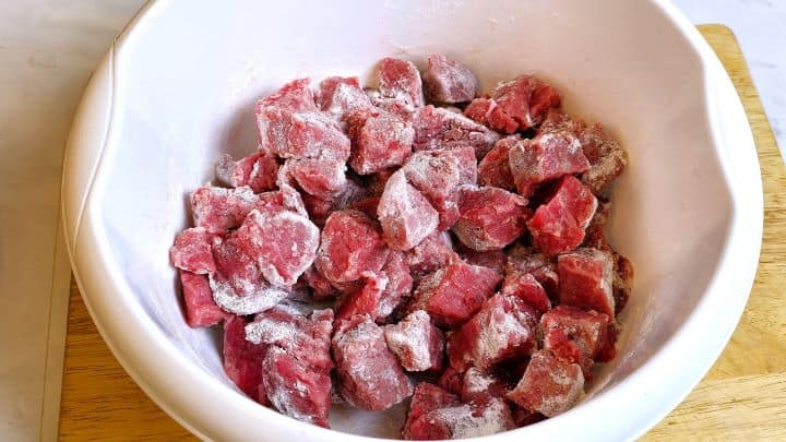 Best Homemade Beef Stew Recipe-Beef Meat Rolled in Wheat Flour Diced Beef Meat With Flour in the Bowl