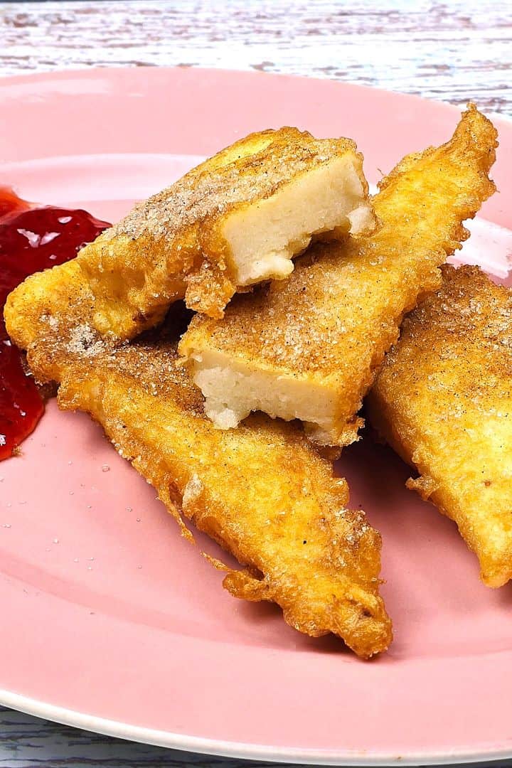 Fried Semolina Pudding Served on Plate With Jam