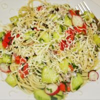 Best Spaghetti Salad Recipe-Served on the Plate with Grated Cheddar