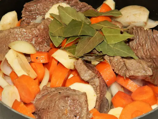 Hungarian Hunter's Stew Recipe-Bay Leaves and Vegetables on the Frying Meat