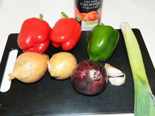 Best Vegetable Stew Recipe-Onions, garlic, leek, bell peppers and canned chopped tomatoes.