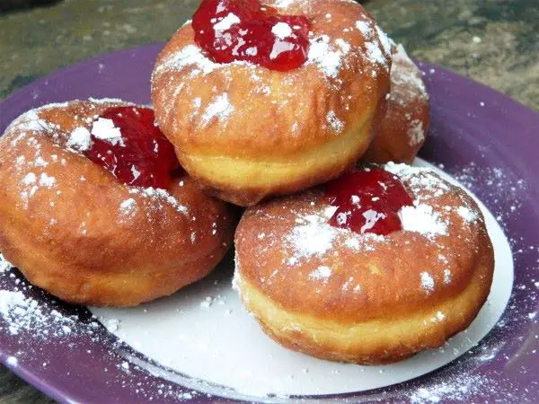 Perfect Yeast Doughnuts-Served on Plate With Strawberry Jam on Top