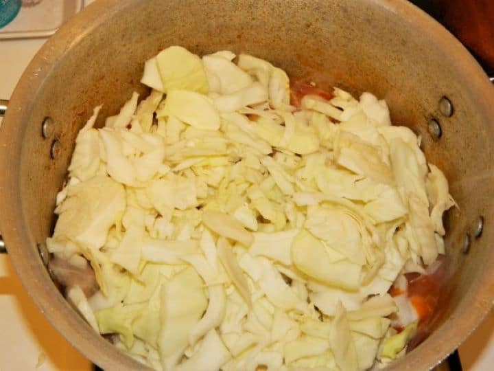 Add Sliced Cabbage on Frying Pork Meat
