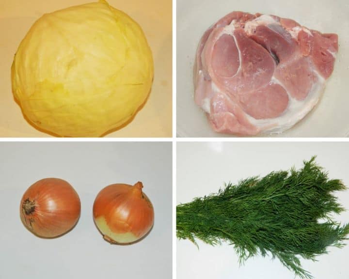 Fresh ingredients for authentic Lucskos Kaposzta arranged on a counter including a large white cabbage, pork shoulder, onions, and fresh dill.