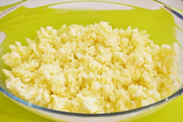 Best Cheesy Potato Casserole Recipe-Grated Potato in Glass Roaster