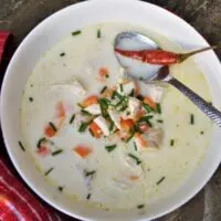 Best Creamy Chicken Soup Recipe-Served in Bowl With Bread and Chilli