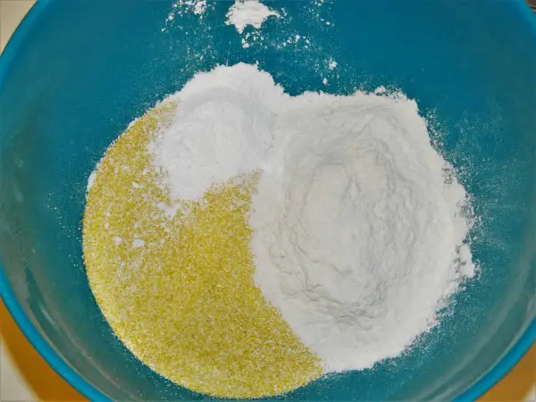 Best Sweet Cornbread Recipe in a World-Wheat Flour, Corn Flour and Baking Powder in Bowl