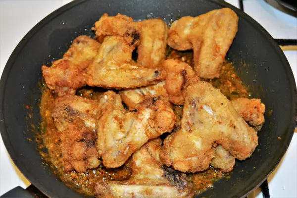Honey and Garlic Chicken Wings Recipe-Add Fried Chicken Wings in the Pan