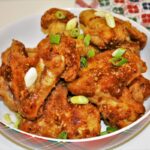 Honey and Garlic Chicken Wings Recipe-Served in Bowl With Chopped Spring Onions
