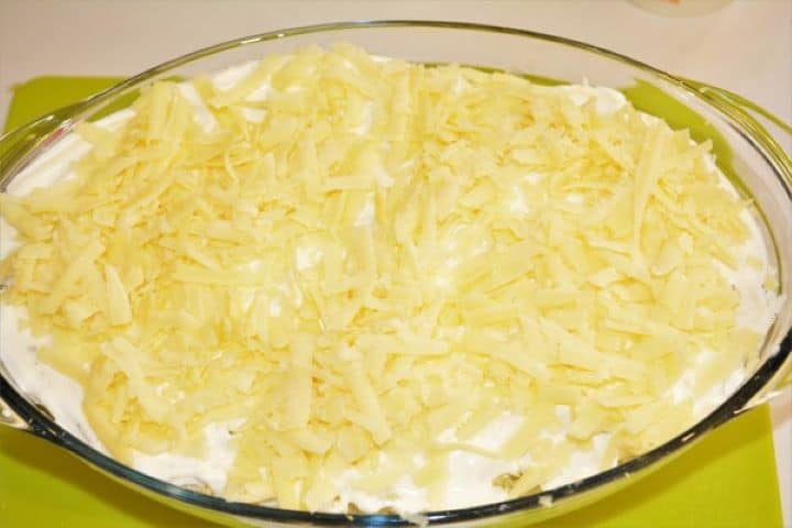 Best Cheesy Potato Casserole Recipe-Grated Cheddar Cheese on the Top of Casserole Grated Cheddar Cheese on the Top of Casserole