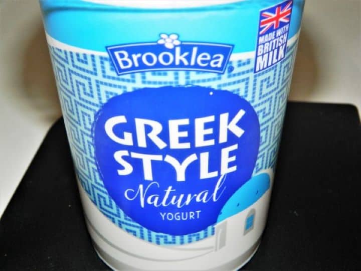 Thick creamy Greek yogurt in a bowl.
