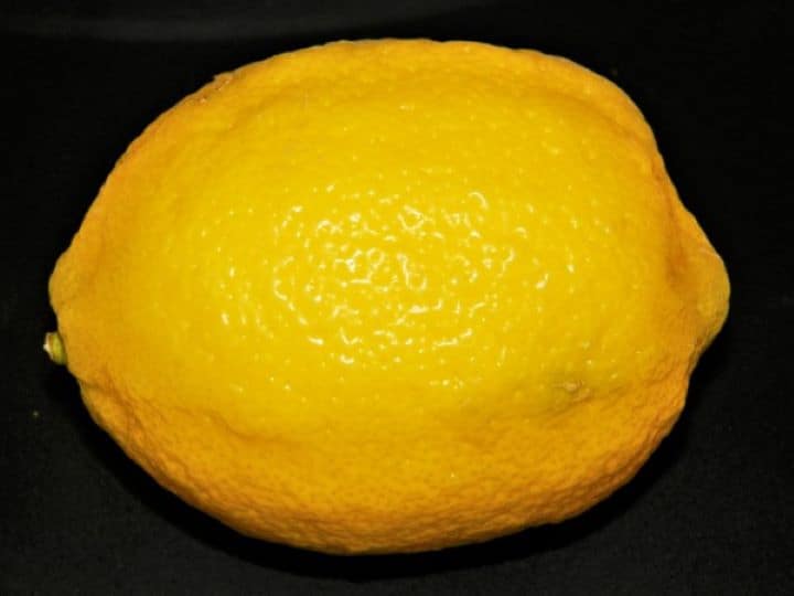 Fresh yellow lemon for grating lemon zest.