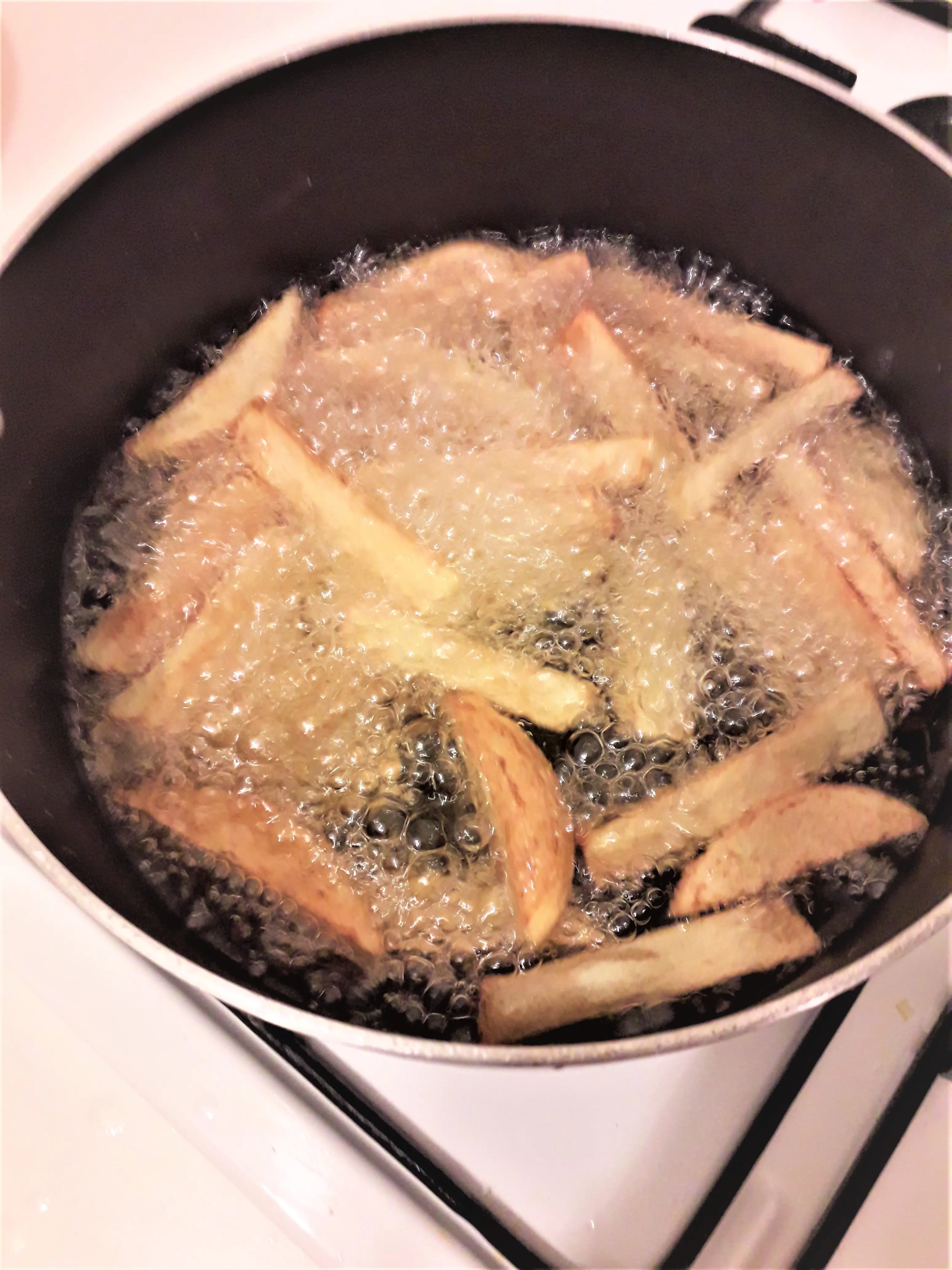 French Fries-Frying Potatoes at High Temperature