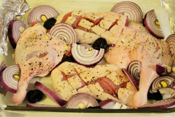 Best Braised Duck Legs Recipe-Sliced Onion on Seasoned Duck Legs and Breasts 