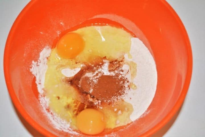 Easy Cinnamon Apple Pancakes Recipe-Flour, Eggs and Cinnamon in the Bowl Flour, Eggs and Cinnamon in the Bowl