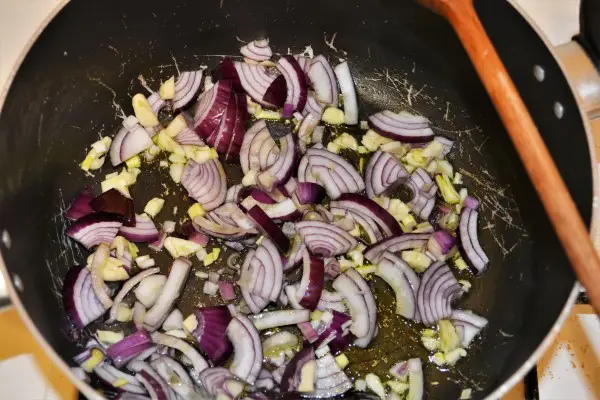 World Best Ratatouille Recipe-Frying Onion and Garlic in the Pot