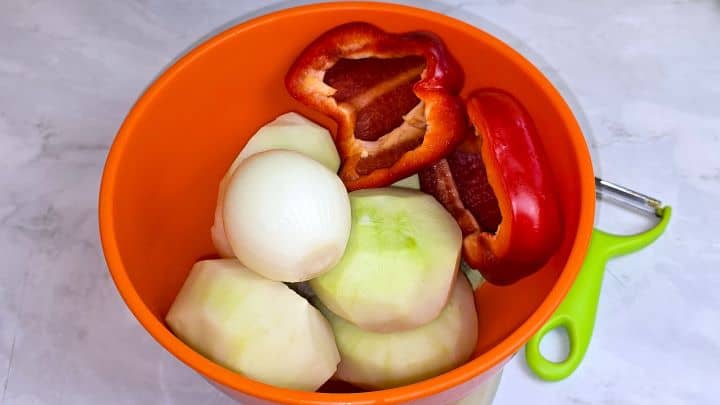 Cleaned and Peeled Onion, Kohlrabi and Red Pepper in the Bowl