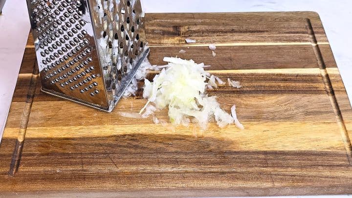 Grated Onion on the Chopping Board
