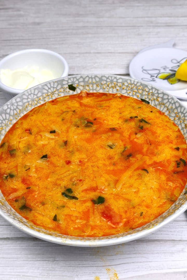 Creamy Kohlrabi Soup Served in Bowl With Sour Cream