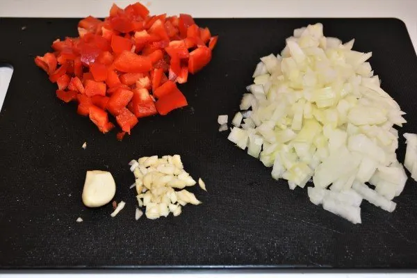 Simple Pork Tenderloin Stew Recipe-Cut Red Bell Pepper, Chopped Onion and Garlic