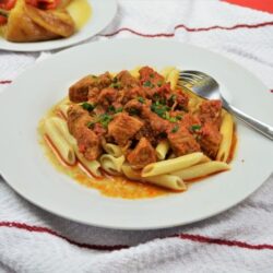 Simple Pork Tenderloin Stew Recipe-Served With Penne Pasta on Plate