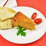 The Best Turkey Meatloaf Recipe-Served on White Plate With Toast and Cherry Tomatoes