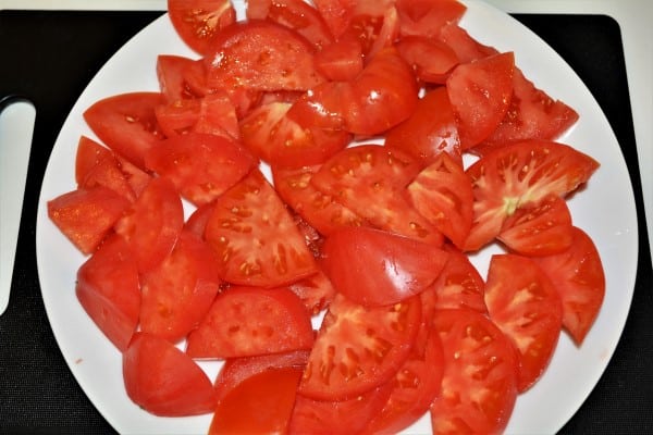Tomatoes Caprese Salad Recipe-Sliced Red Tomatoes on the Plate