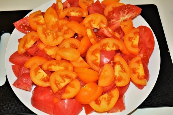 Tomatoes Caprese Salad Recipe-Sliced Red and Yellow Tomatoes on the Plate
