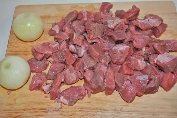 Beef and Cabbage Stew Recipe-Peeled Onions and Beef Meat Cut in Cubes