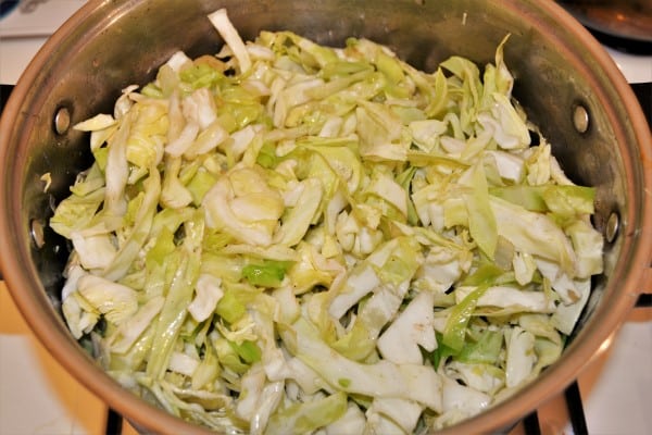 Beef and Cabbage Stew Recipe-Sliced Cabbage on the Fried Chopped Onion