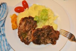 Easy Oven Baked Pork Steak Recipe-Served on Plate With Mashed Potatoes