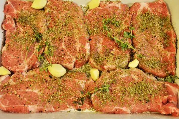 Easy Oven Baked Pork Steak Recipe-Sliced Pork Neck Seasoned With Thyme and Marjoram