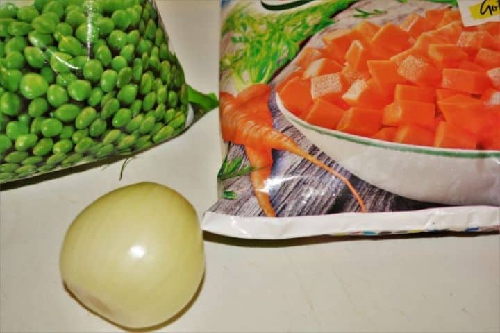 Onion and Frozen Pea and Carrots on the Table