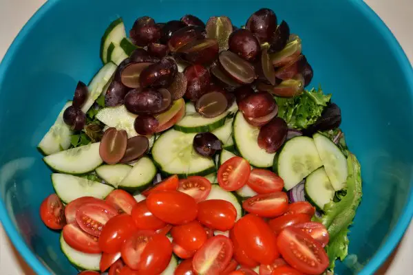 Best Homemade Chicken Salad Recipe - Grapes, Cucumber, Cherry Tomatoes, Red Onion and Baby Leaf Salad in the Bowl