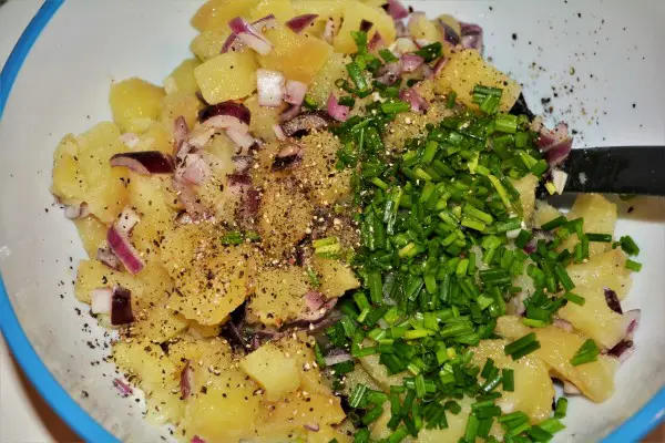 Best Simple Potato Salad Recipe-Chopped Chives and Ground Pepper on the Potato Salad