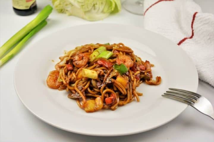 King Prawn Noodles Recipe - Served on Plate Finished plate of teriyaki king prawn noodles served with a cold beer