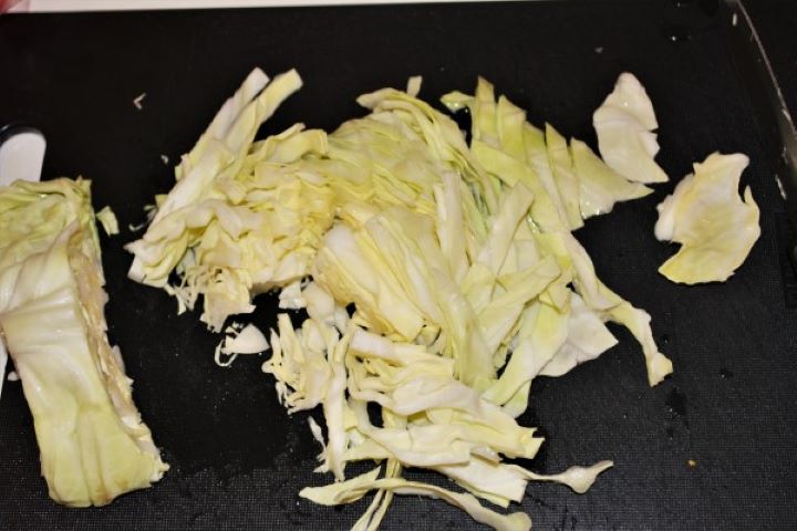 King Prawn Noodles Recipe - Sliced Sweetheart Cabbage Sliced Sweat Heart Cabbage on Chopping Board