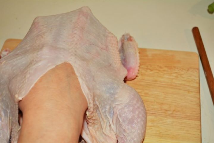 Baked Stuffed Whole Chicken Recipe-Put Our Hand Under the Chicken Skin Put the hand under the chicken skin to make a whole.