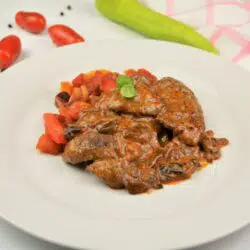 Best Turkey Tenderloin Recipe - Served on Plate With Vegetables Stew