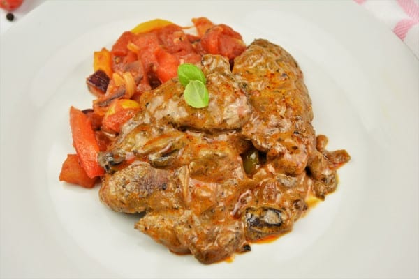 Best Turkey Tenderloin Recipe - Served on Plate With Vegetables Stew