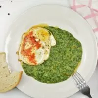 Quick Creamed Spinach Recipe - Served on Plate With Fried Egg